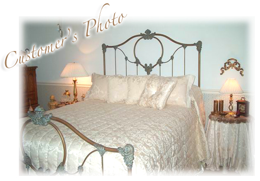 Glorius's elegant bedroom with iron bed